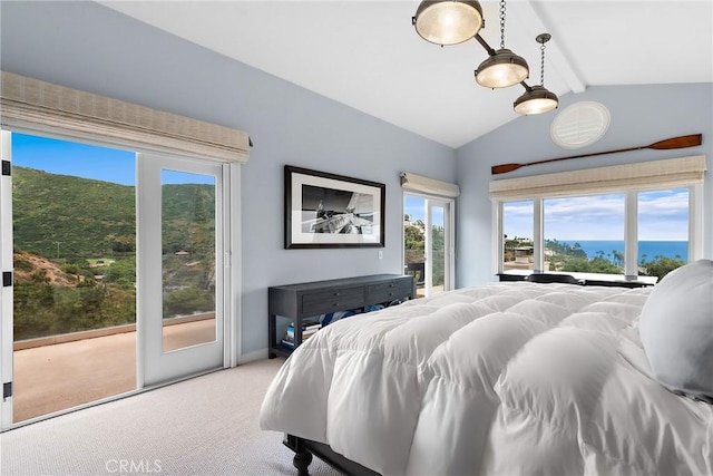 bedroom featuring vaulted ceiling with beams, light colored carpet, multiple windows, and access to exterior