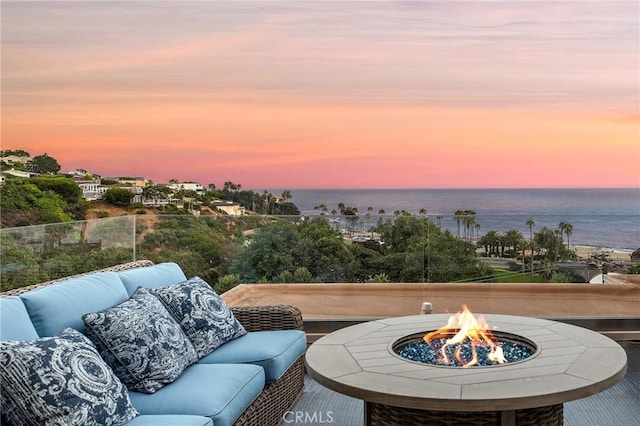 21732 Wesley Dr Unit 6, Laguna Beach, CA 92651 - view of patio with a water view and an outdoor living space with a fire pit