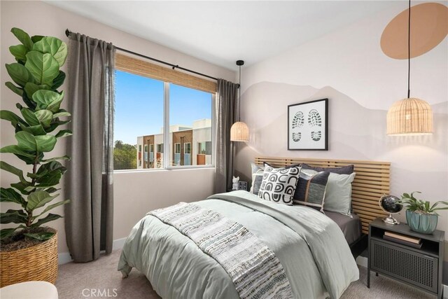1810 E 1st St Unit 130, Santa Ana, CA 92705 - carpeted bedroom featuring baseboards