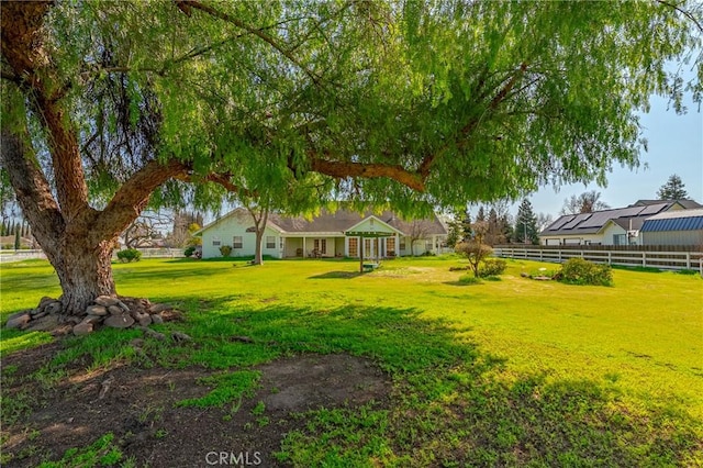 view of yard with fence