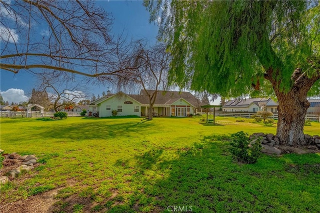 view of yard with fence