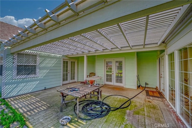 view of patio featuring french doors and a pergola