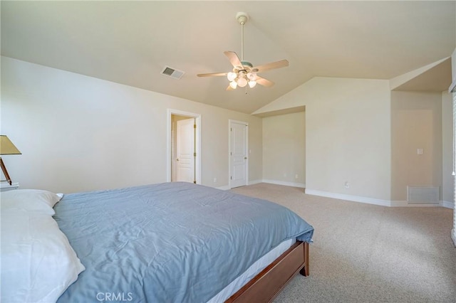 bedroom featuring visible vents, baseboards, carpet, and vaulted ceiling