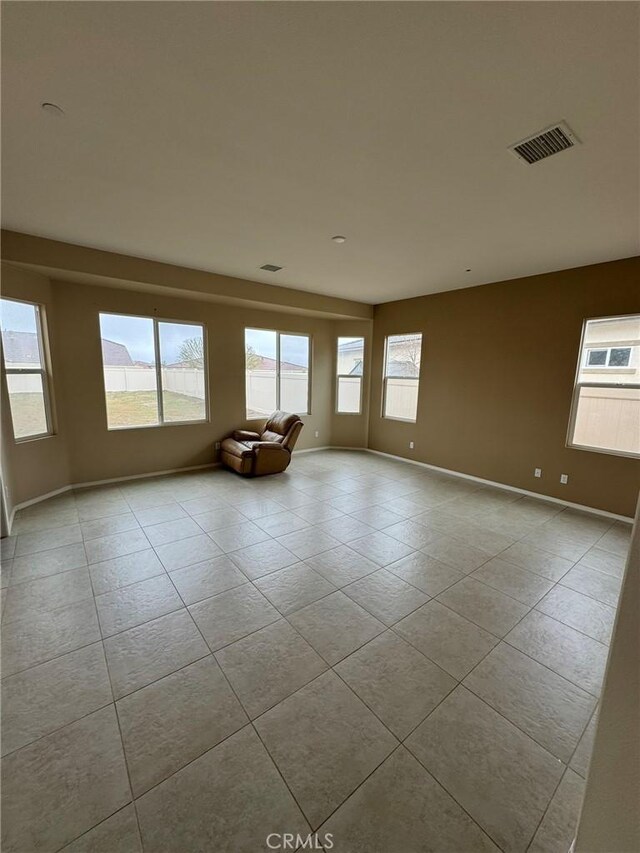 1572 Humboldt Peak, Beaumont, CA 92223 - tiled empty room featuring baseboards