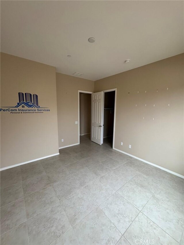 1572 Humboldt Peak, Beaumont, CA 92223 - unfurnished room featuring tile patterned floors and baseboards