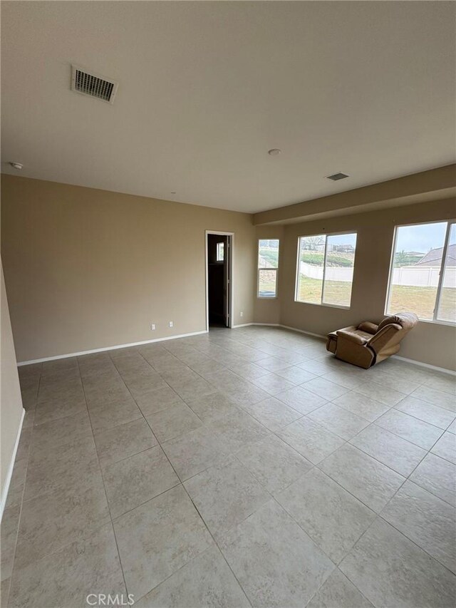 1572 Humboldt Peak, Beaumont, CA 92223 - empty room featuring baseboards and light tile patterned flooring