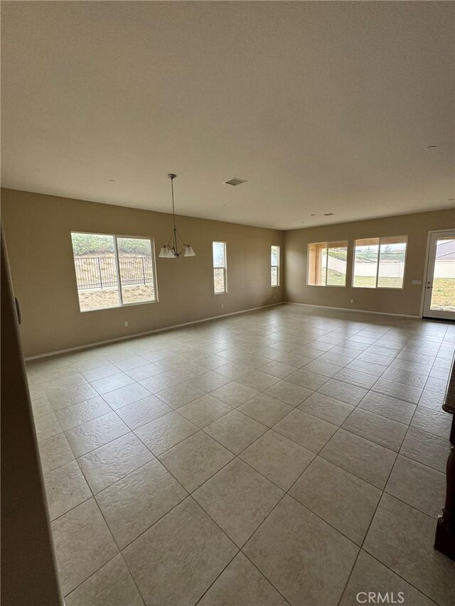 1572 Humboldt Peak, Beaumont, CA 92223 - spare room with baseboards and tile patterned flooring