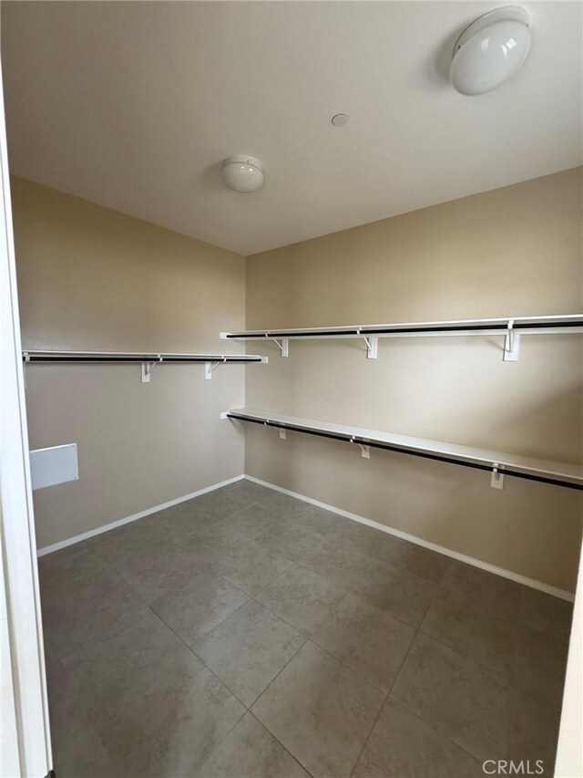 1572 Humboldt Peak, Beaumont, CA 92223 - spacious closet with tile patterned flooring