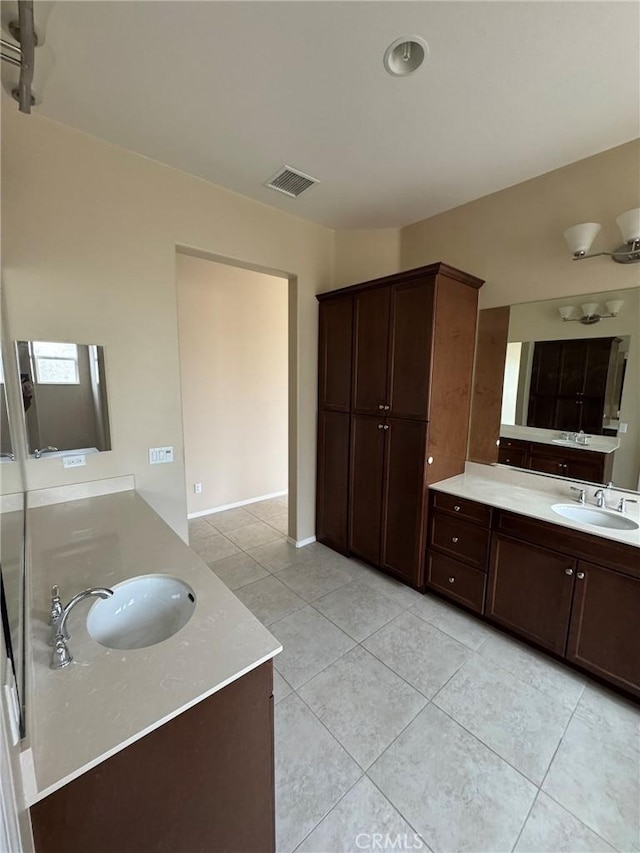 1572 Humboldt Peak, Beaumont, CA 92223 - bathroom with tile patterned floors and two vanities