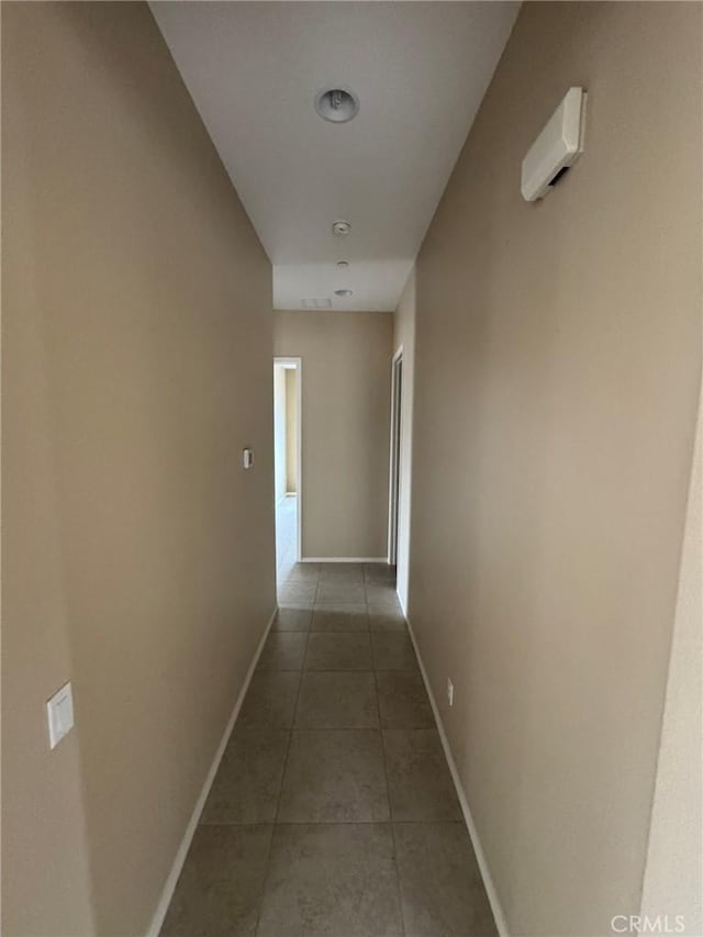 1572 Humboldt Peak, Beaumont, CA 92223 - corridor featuring baseboards and tile patterned flooring