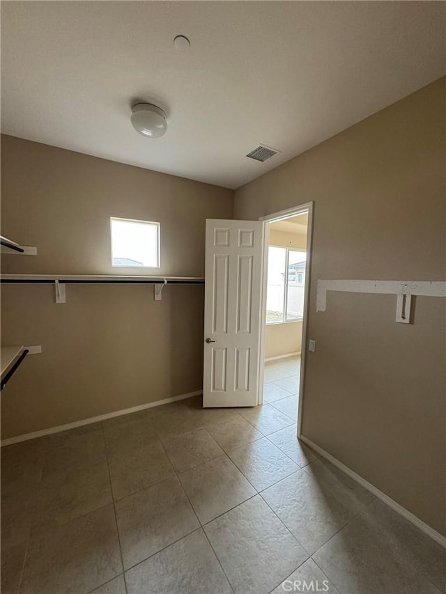 1572 Humboldt Peak, Beaumont, CA 92223 - spacious closet with light tile patterned floors