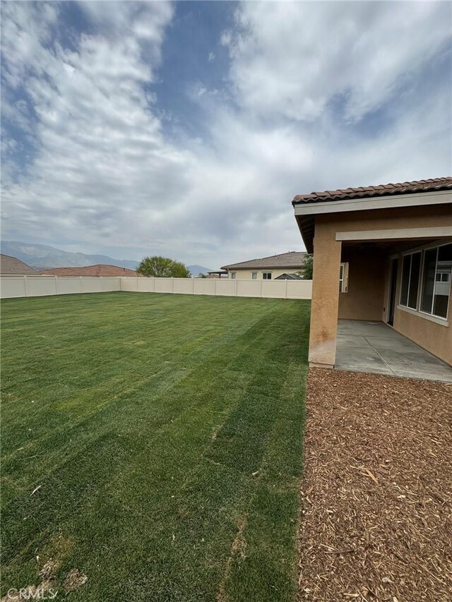1572 Humboldt Peak, Beaumont, CA 92223 - view of yard featuring a patio
