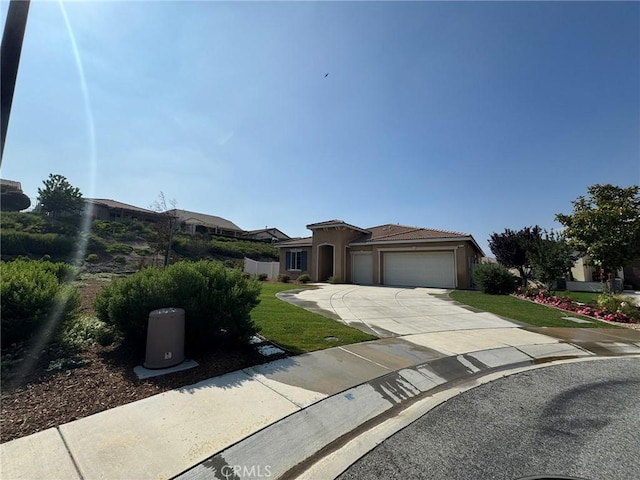 1572 Humboldt Peak, Beaumont, CA 92223 - mediterranean / spanish-style home featuring an attached garage, concrete driveway, and a front lawn