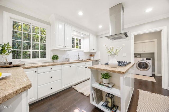 kitchen featuring crown molding, island range hood, white cabinets, washer / clothes dryer, and open shelves