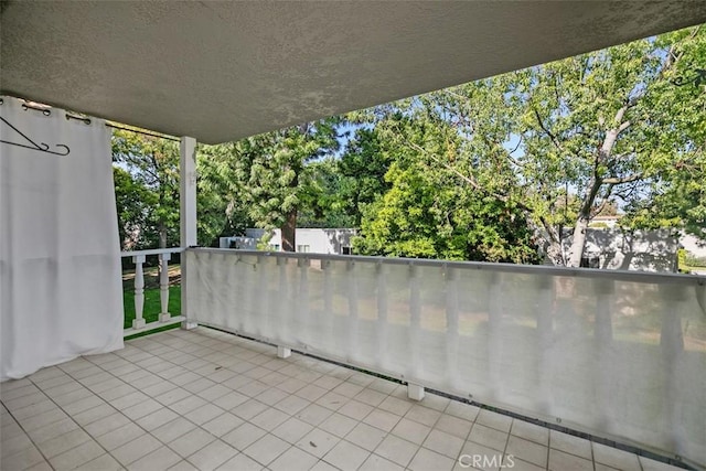 2405 Via Mariposa W Unit 2G, Laguna Woods, CA 92637 - balcony with view of scattered trees