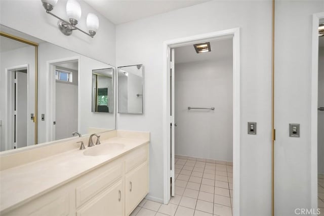 2405 Via Mariposa W Unit 2G, Laguna Woods, CA 92637 - bathroom with vanity and tile patterned floors