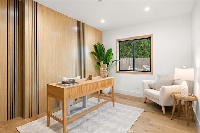 home office featuring baseboards, recessed lighting, and wood finished floors