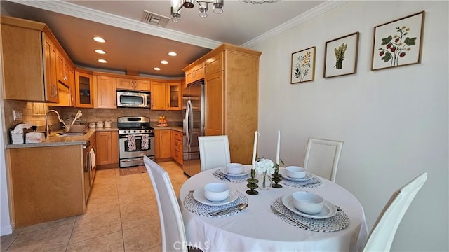 8166 Laguna Ct, Stanton, CA 90680 - dining room with recessed lighting, visible vents, crown molding, and light tile patterned flooring