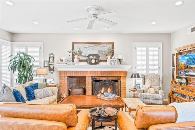 22432 Rosebriar, Mission Viejo, CA 92692 - living room with a brick fireplace, a ceiling fan, recessed lighting, and healthy amount of natural light