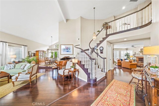 22432 Rosebriar, Mission Viejo, CA 92692 - entryway with high vaulted ceiling, stairs, wood finished floors, a ceiling fan, and beamed ceiling