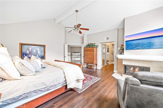 22432 Rosebriar, Mission Viejo, CA 92692 - bedroom featuring wood finished floors, beam ceiling, a fireplace, ceiling fan, and high vaulted ceiling