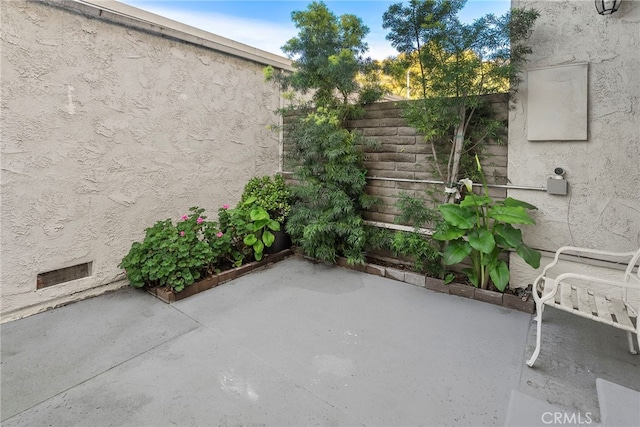 view of patio with fence