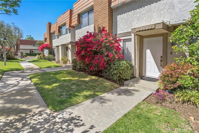 view of property with a residential view