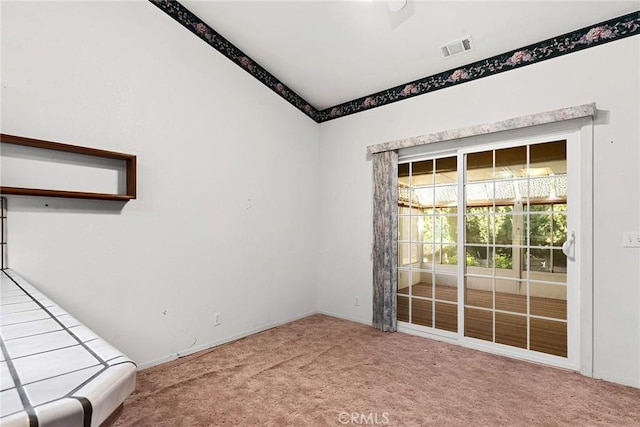 unfurnished room with visible vents, baseboards, and carpet floors
