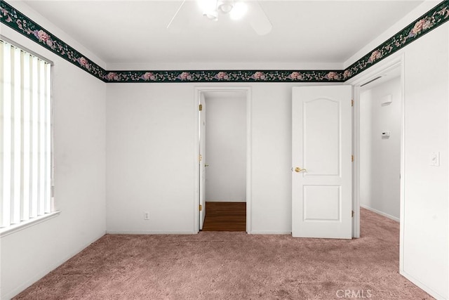 unfurnished bedroom featuring carpet flooring