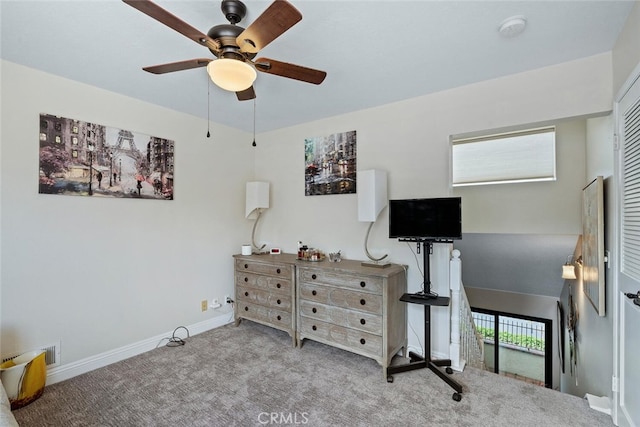 bedroom featuring carpet floors, baseboards, and visible vents