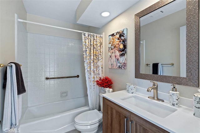 bathroom with vanity, toilet, and shower / bath combo with shower curtain
