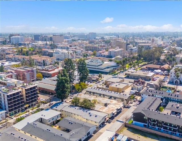 drone / aerial view featuring a city view