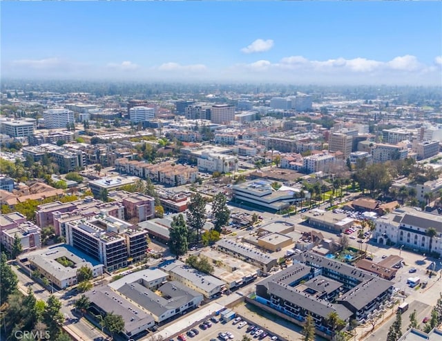 birds eye view of property with a city view