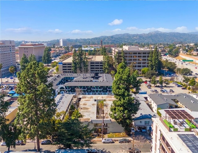 bird's eye view featuring a city view and a mountain view