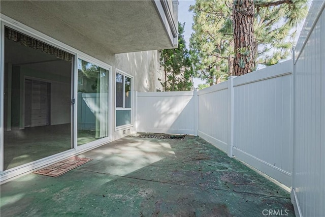 view of patio with a fenced backyard