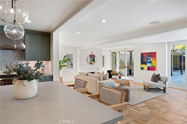 dining space featuring recessed lighting and french doors