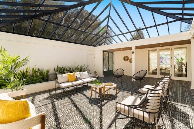 view of patio featuring an outdoor living space, french doors, and a lanai