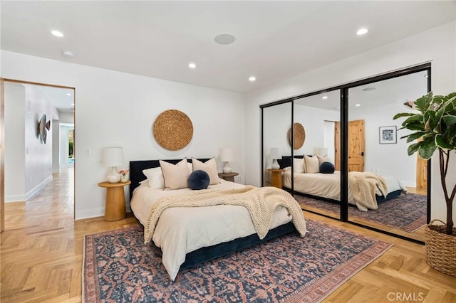 bedroom featuring recessed lighting and baseboards