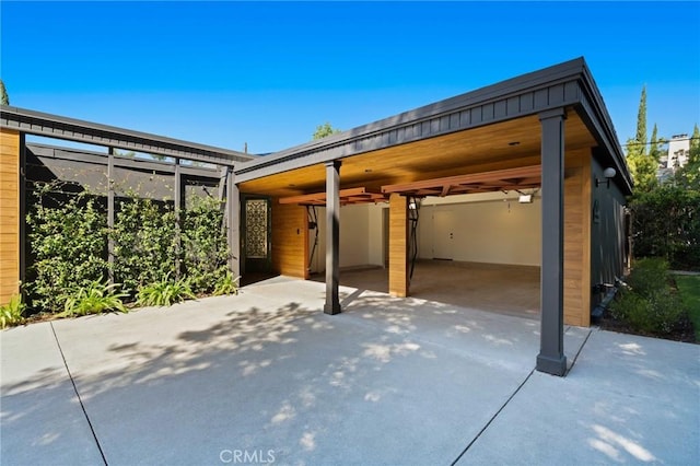 view of patio / terrace with concrete driveway