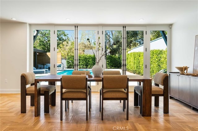 dining space with baseboards