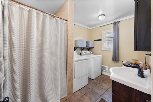 full bath with vanity, separate washer and dryer, tile patterned floors, visible vents, and ornamental molding