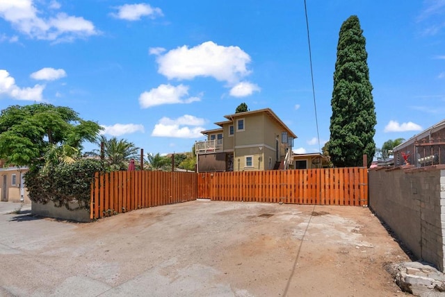 view of patio featuring fence private yard and a gate