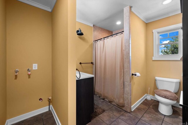 bathroom with curtained shower, baseboards, toilet, ornamental molding, and tile patterned floors