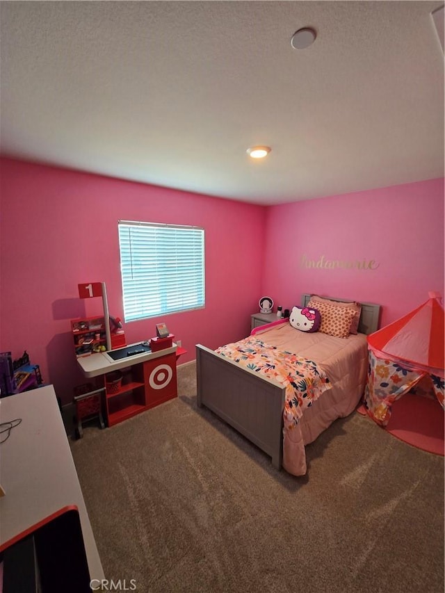 bedroom featuring carpet