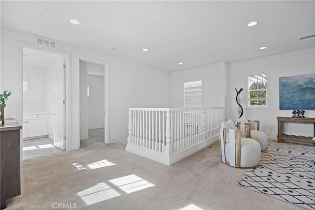 bedroom featuring visible vents, carpet floors, and recessed lighting