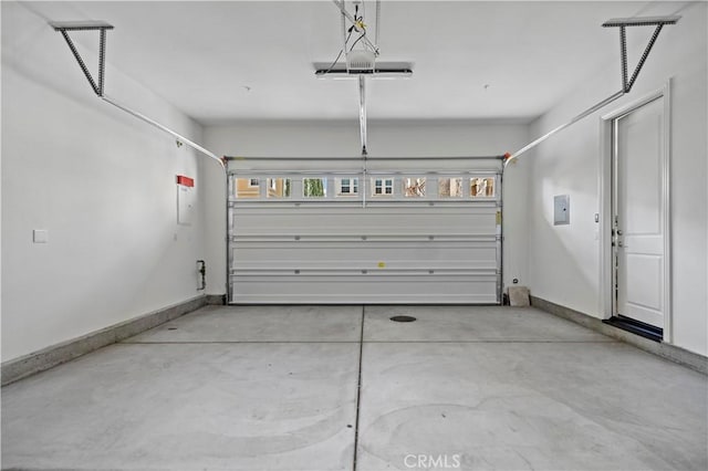 garage featuring baseboards