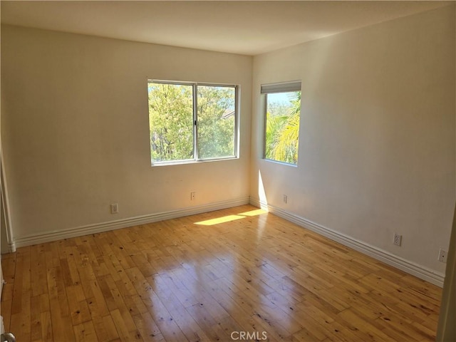 19392 Highridge Way, Trabuco Canyon, CA 92679 - spare room featuring light wood-style flooring and baseboards
