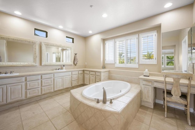 2185 Twain Ave, Carlsbad, CA 92008 - bathroom with a garden tub, recessed lighting, tile patterned flooring, double vanity, and plenty of natural light