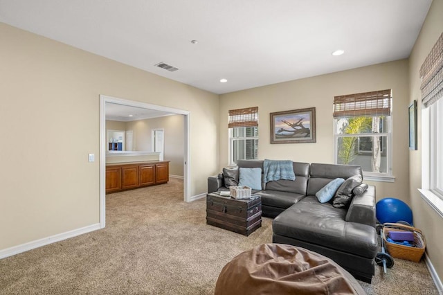 2185 Twain Ave, Carlsbad, CA 92008 - living area with light carpet, baseboards, and recessed lighting