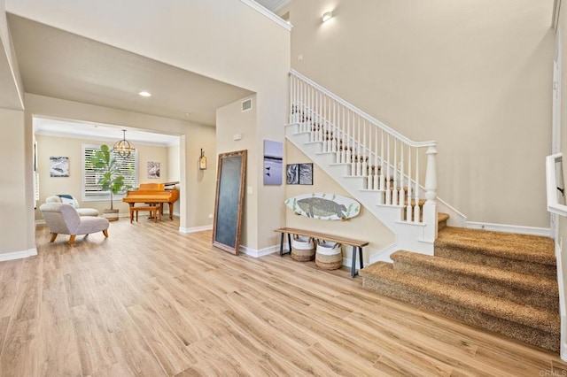 2185 Twain Ave, Carlsbad, CA 92008 - foyer entrance featuring stairs, wood finished floors, baseboards, a chandelier, and recessed lighting